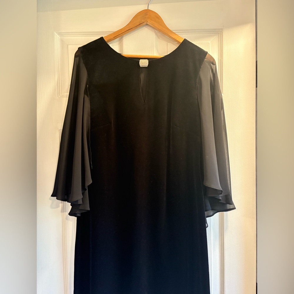 Elegant Black Dress with Sheer Sleeves